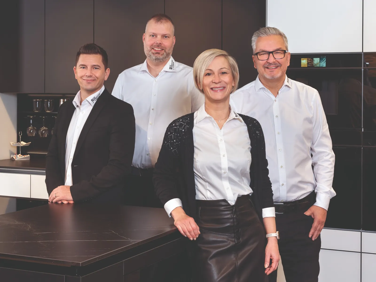 Das Küchenteam von Die Einrichtung Kleemann, vier Berater in der Küchenausstellung